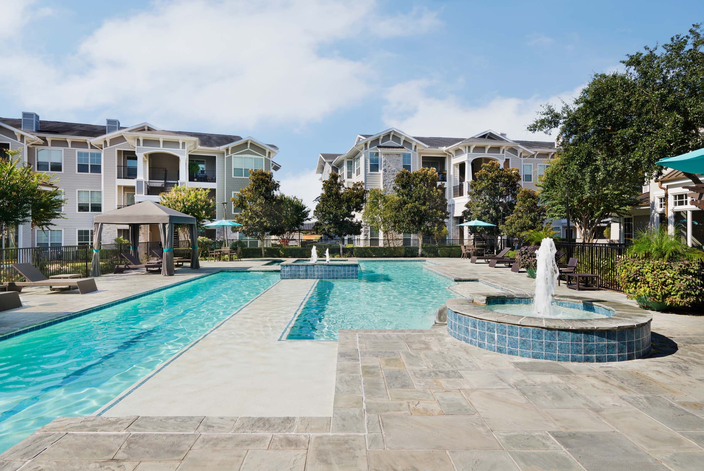 Relaxing Pool with Sun Deck and Fountain