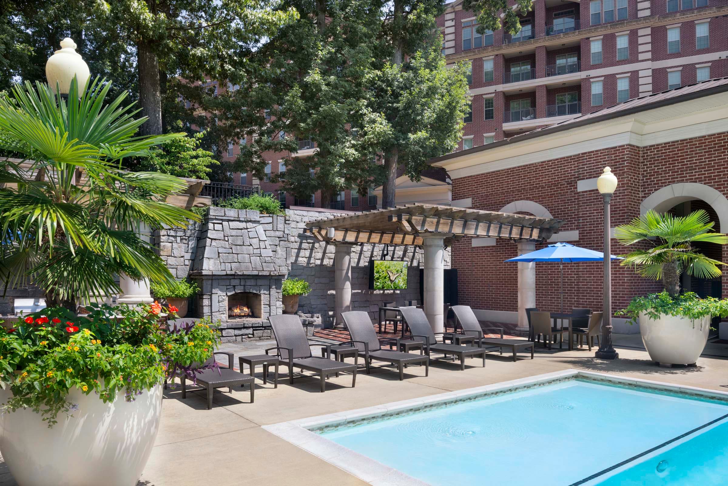 Outdoor Dining Area with Fireplace at the Terraces