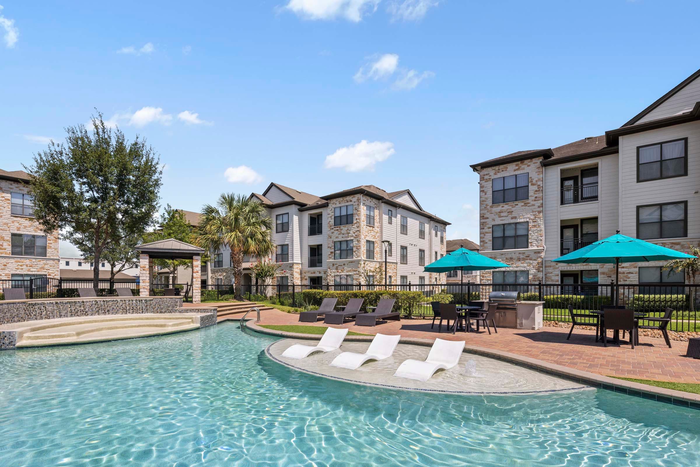 Resort-Style Pool with Tanning Shelf and WiFi