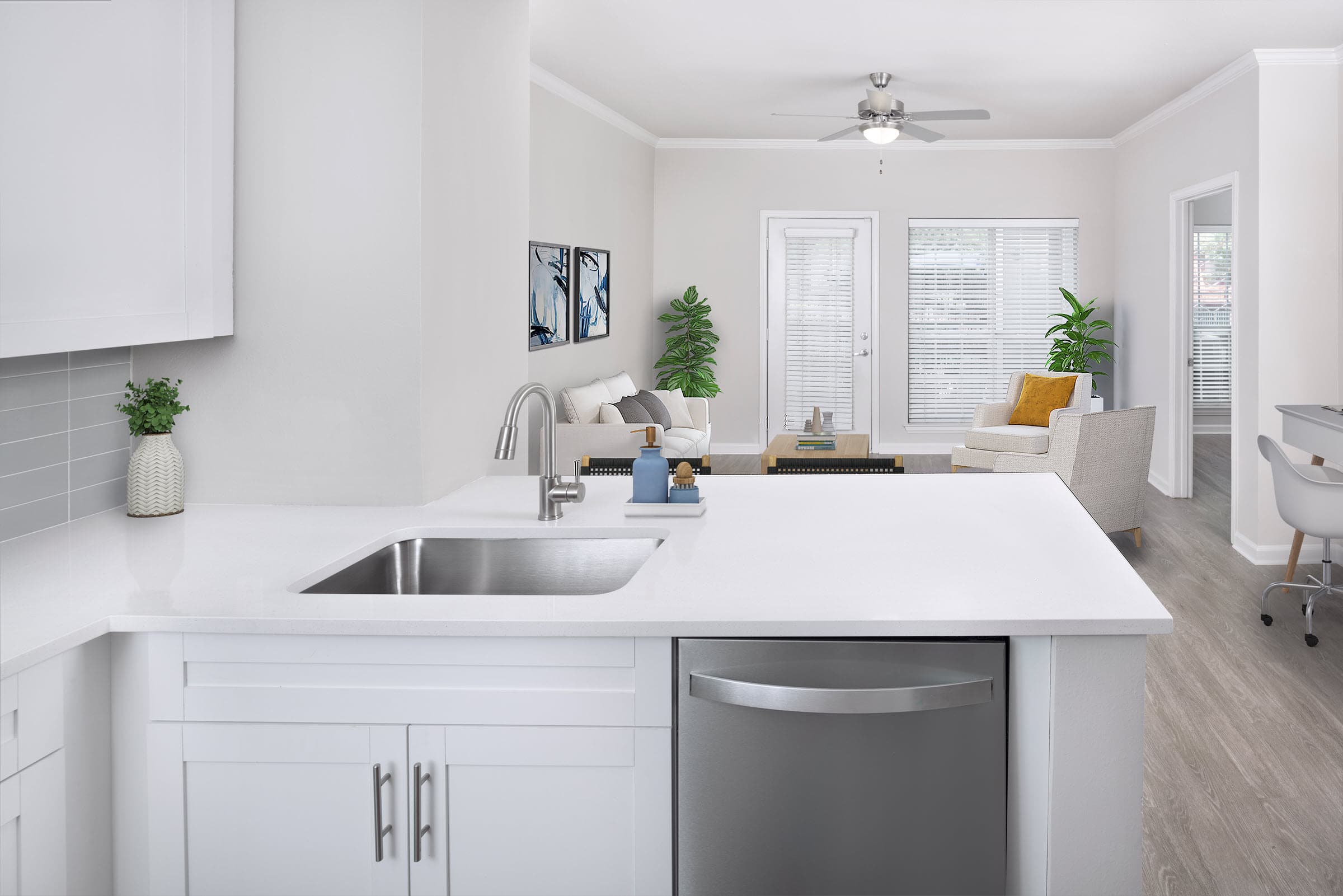 Kitchen with White Quartz Countertops and Single-Basin Undermount Sink