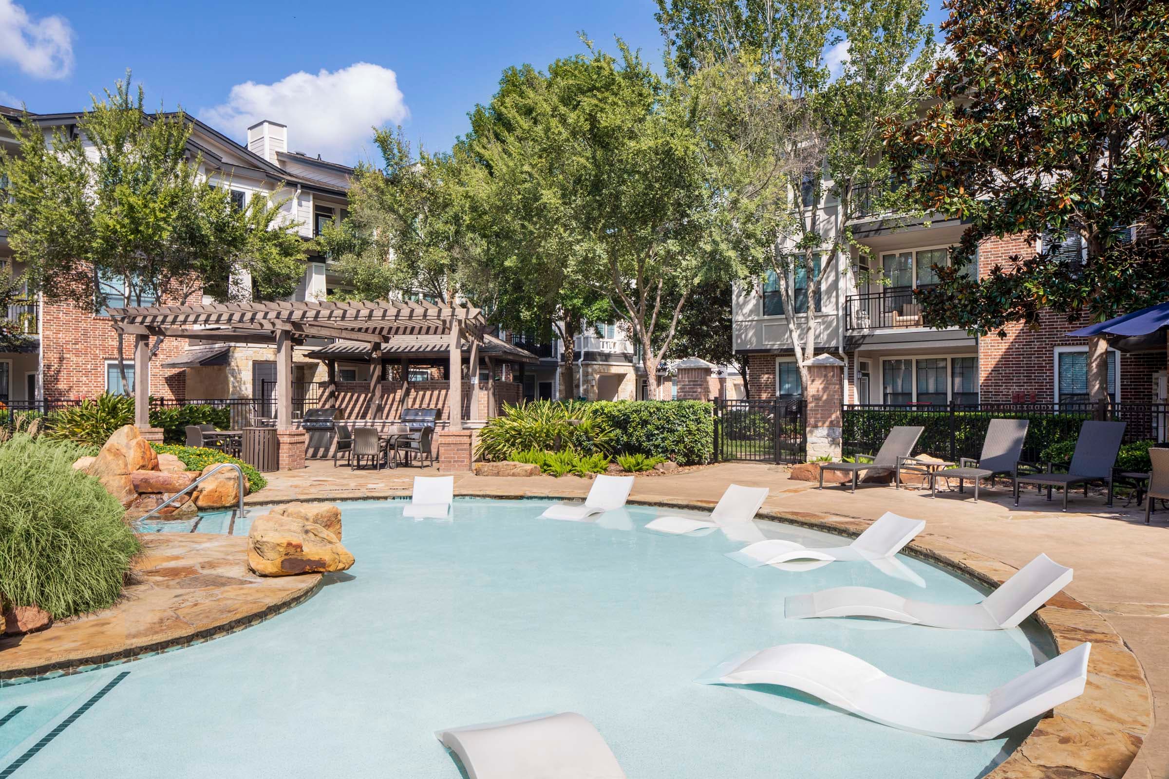 Resort-Style Pool with Sun Loungers