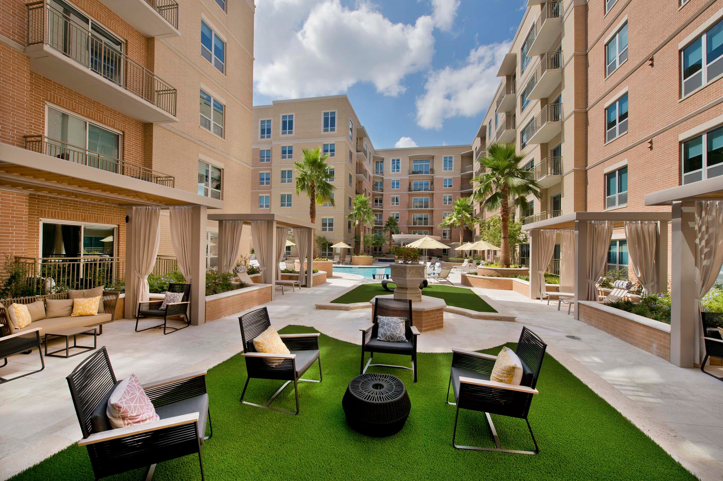 Poolside Courtyard with Cabanas